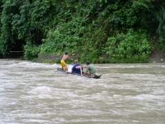 my son with Nate going ahead into the rapids